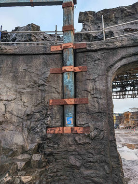 Metal pole within set