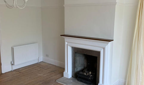 Front room with freshly painted walls