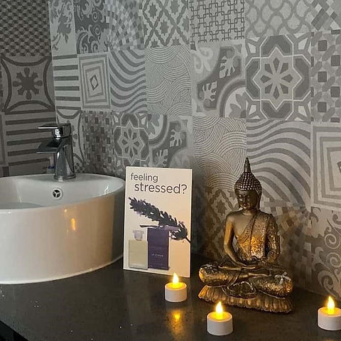 Beautiful patterned tiles in peaceful bathroom