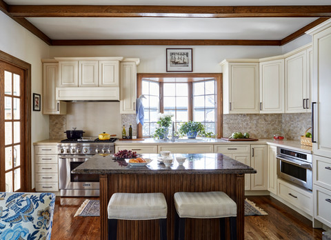 "White kitchen remodel in Elmhurst IL with granite island and brown glazed white cabinets"