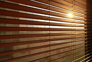 Wood_shutterstock_60676891_Sunlight-behind-vertical-blinds.jpg
