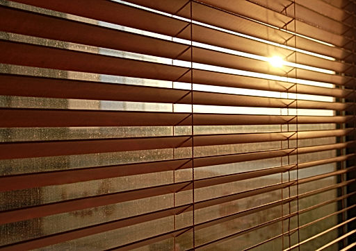 Wood_shutterstock_60676891_Sunlight-behind-vertical-blinds.jpg