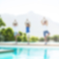 Yoga practice by the pool