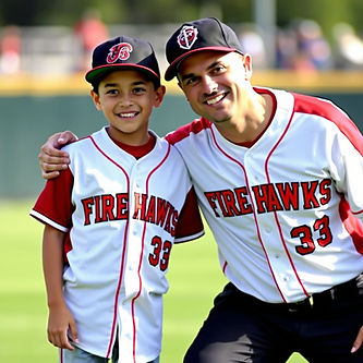 young child being mentored by adult both wearing baseball jerseys that say firehawks.jpg