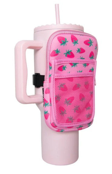 Subtle strawberry tumbler zipper pouch on a pink cup