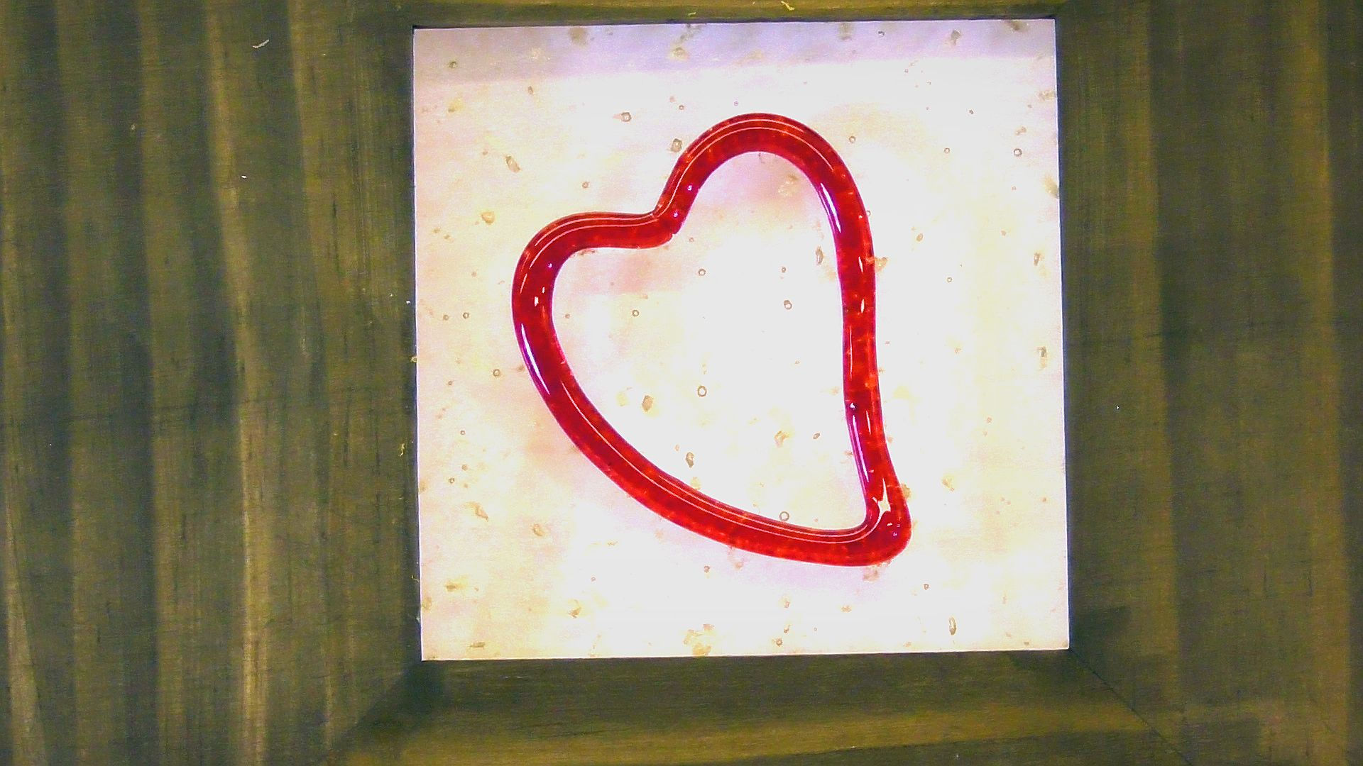 Tavla med rött hjärta