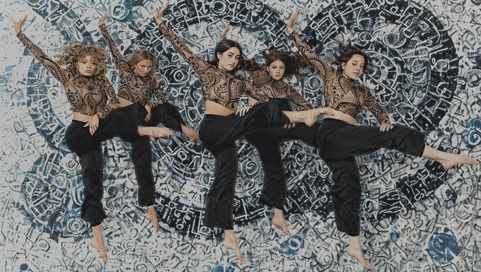 Teen dancers in contemporary dance costumes. 