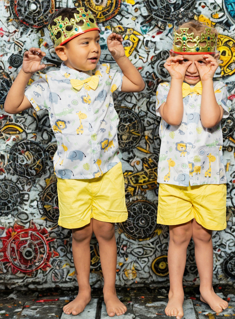 Two beginner child dancers dressed up in dance costumes. 