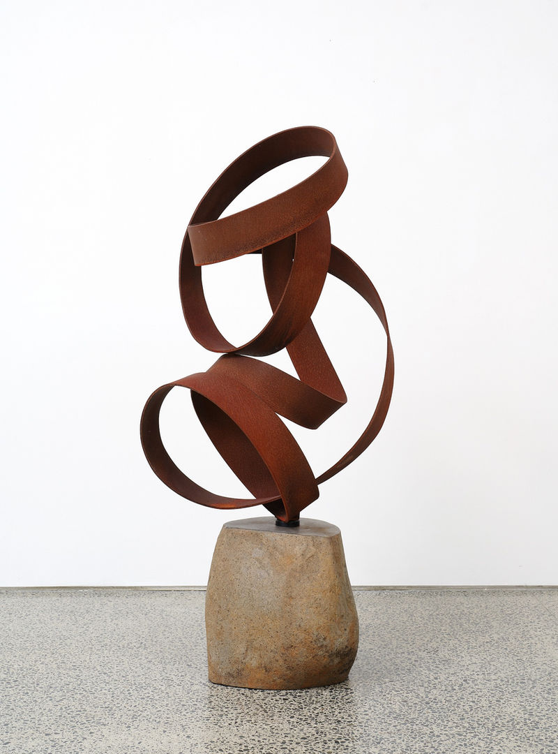 Travel VII (2023), corten steel on stone, sculpture by Ray Haydon