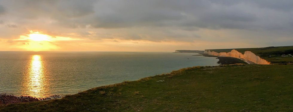 beautiful UK sunset Birling Gap Cliff UK ocean