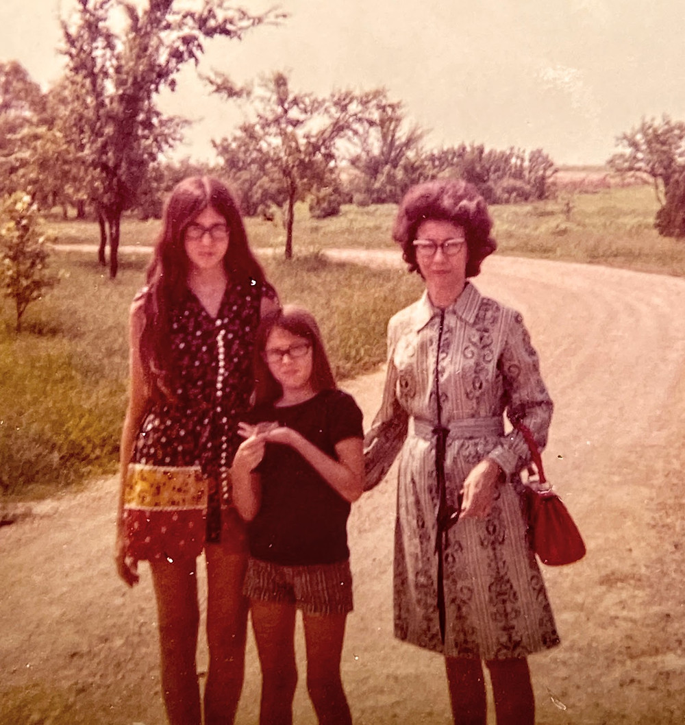 Historic photo circa 1970 Mother with two daughters one holding a horned toad in Texas