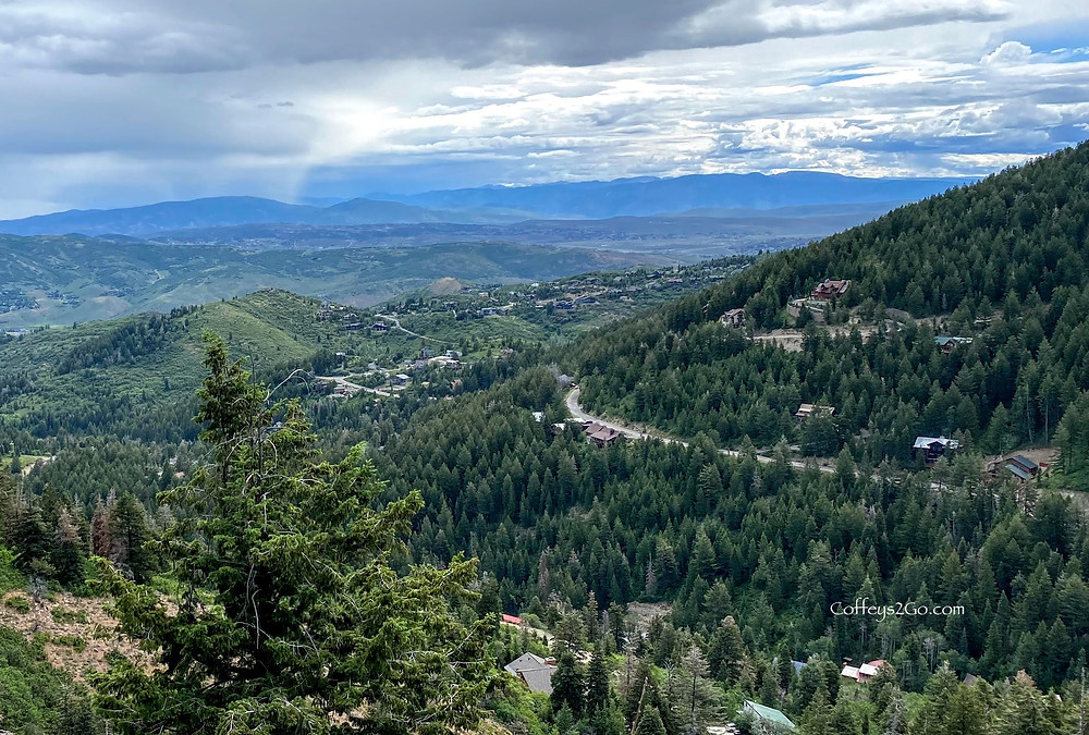 Park City Utah hiking trail with gorgeous clouds up above Kimball Junction