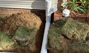 buried-downspout-lines-1-1024x683.jpg.webp