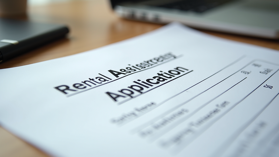 Close-up view of rental assistance application forms on a desk