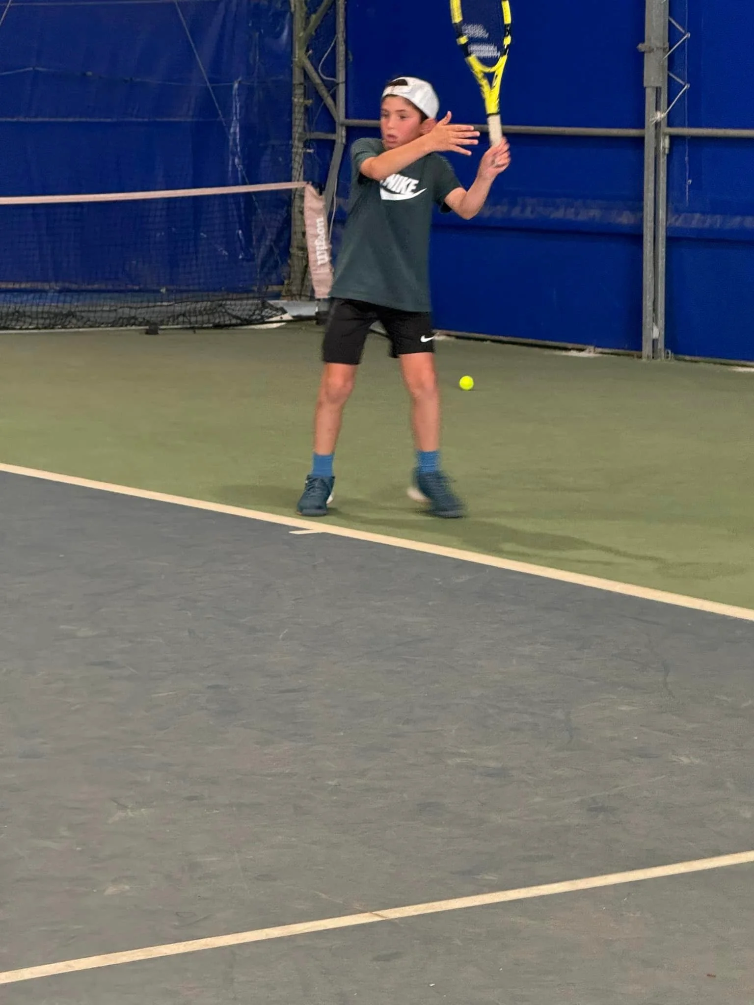 Tennis kid on court