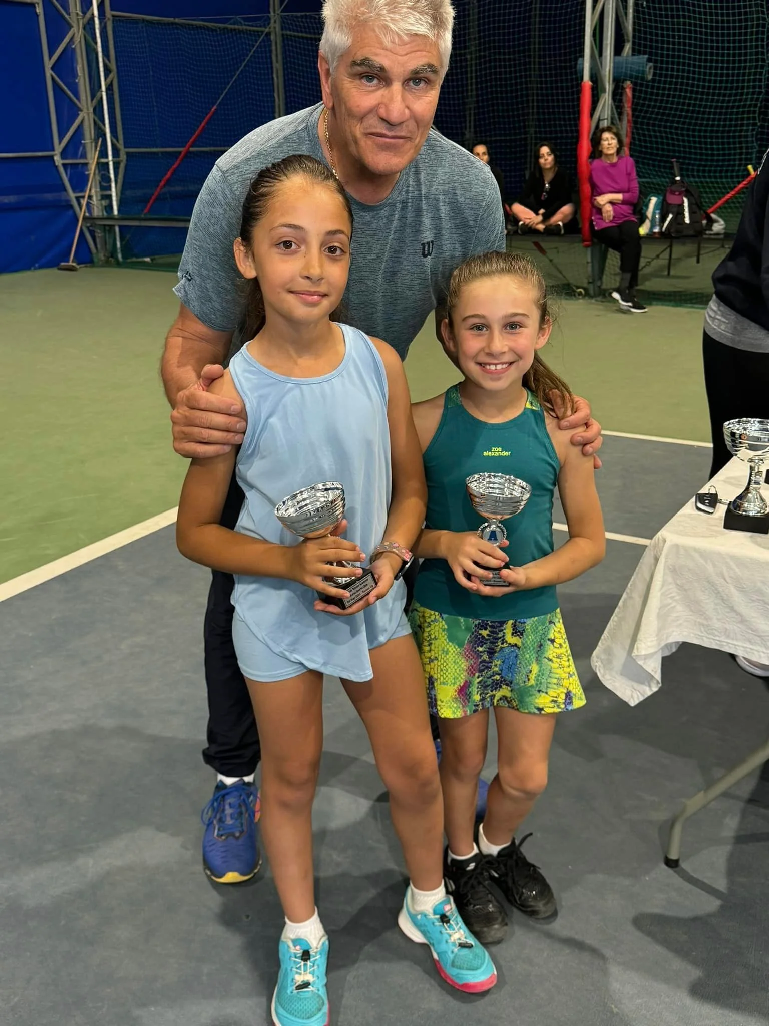 Tennis kids on court