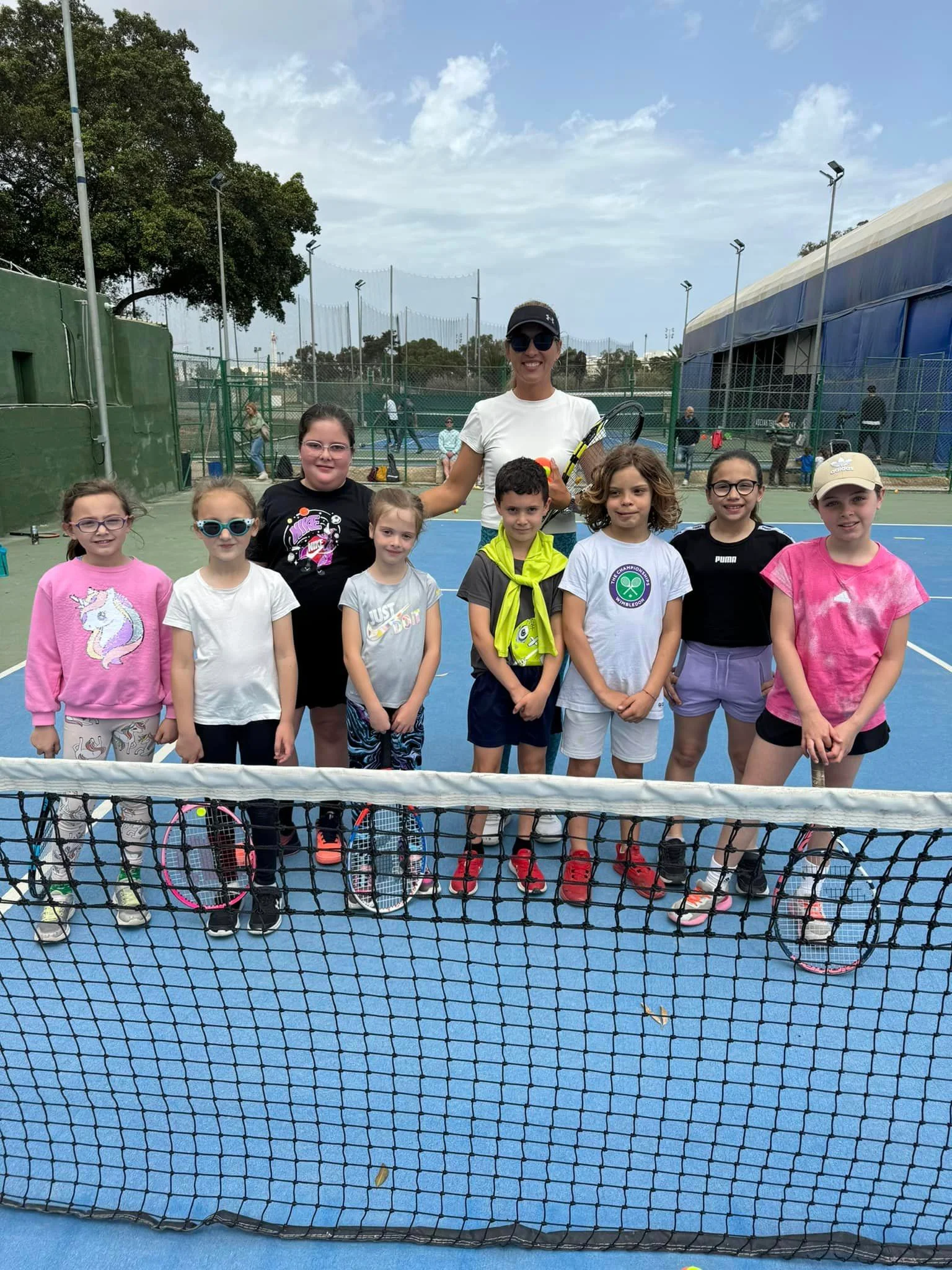 Tennis kids on court