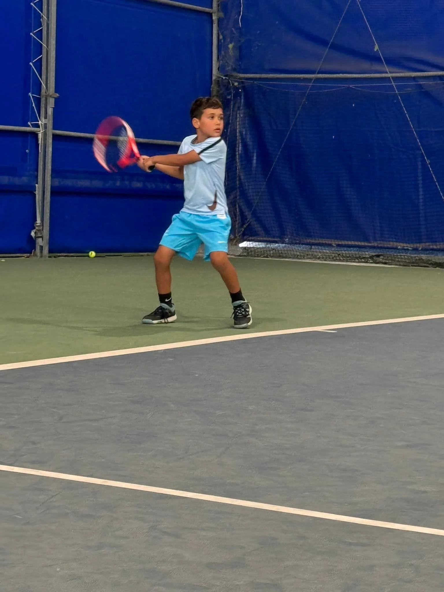 Tennis kid on court