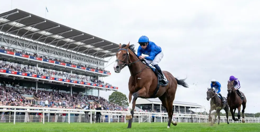 Ombudsman powers to victory at the Juddmonte International in York, leaving competitors trailing behind amid an electrifying atmosphere.