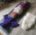 Sacred Openings' owner, birth and postpartum doula, Kayla Brookins, wrapped from head to toe in rebozos during a Closing of the Bones Ceremony.