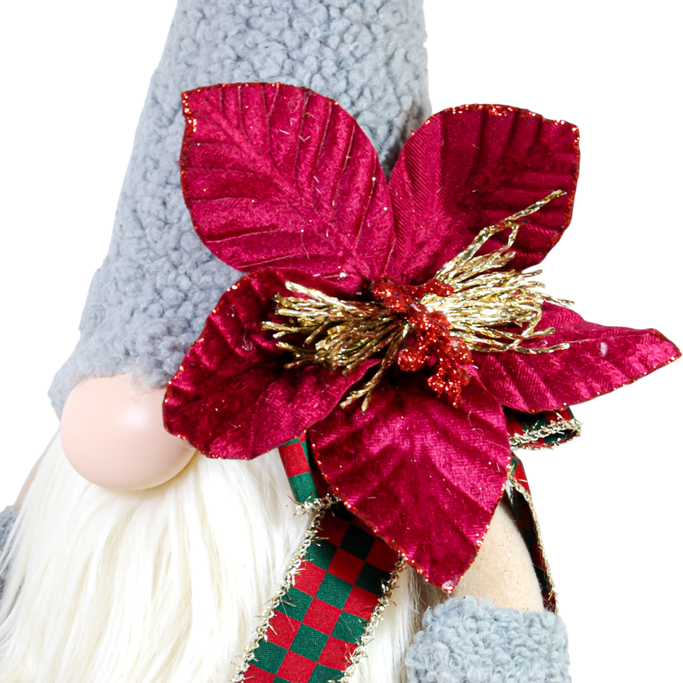 Gri tonlarındaki gövdesi ve yumuşak sakal yap ısıyla peluş hediyelik cücenin yan profil duruşu.