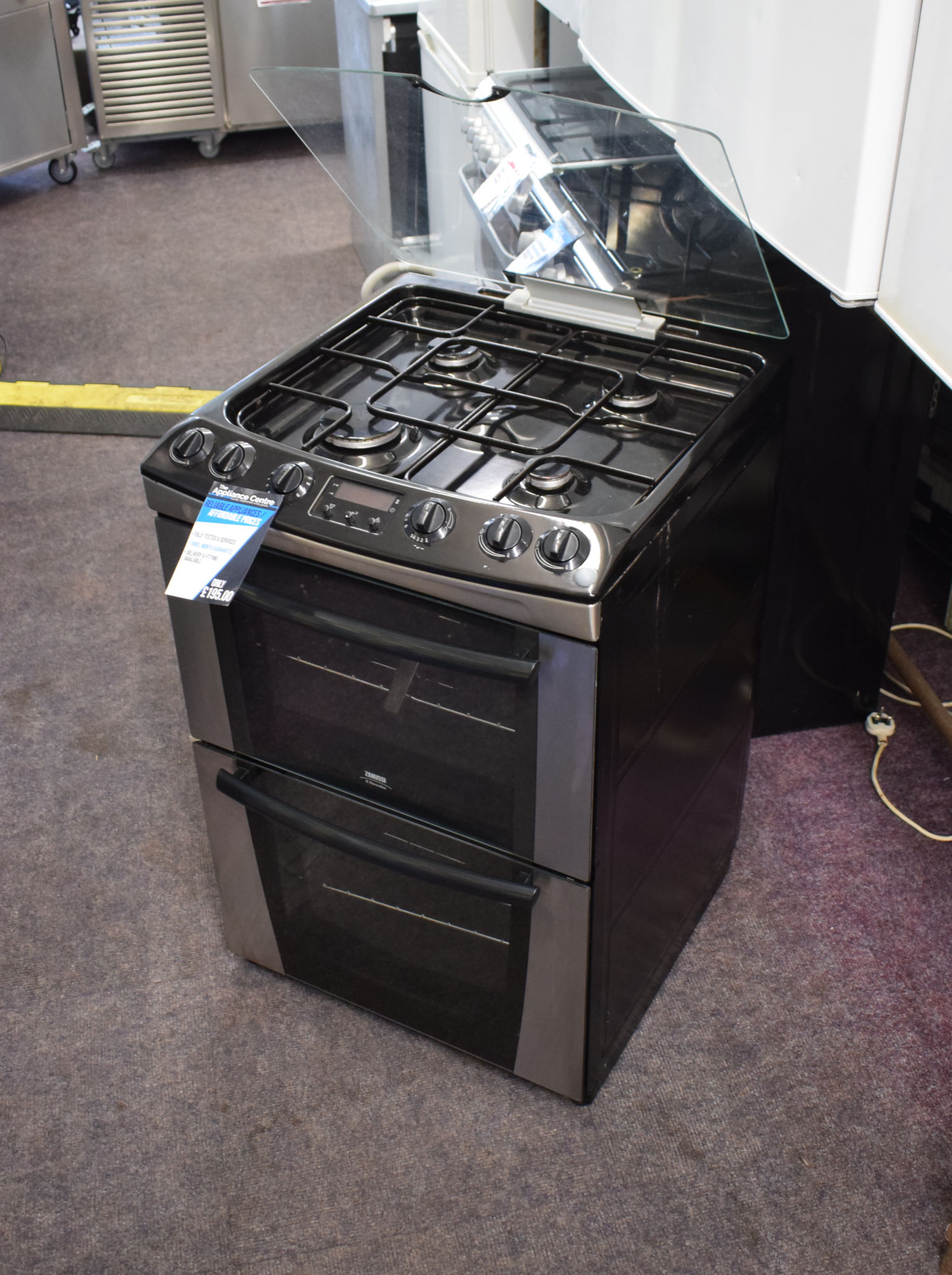 Zanussi black 4burner gas cooker