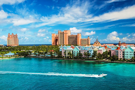 Aerial view of the Atlantis Resort on Paradise Island with turquoise ocean waters and white-sand beaches surrounding the prop