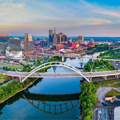 Aerial view of downtown Tennessee – city skyline, buildings, and surrounding landscape captured from above.