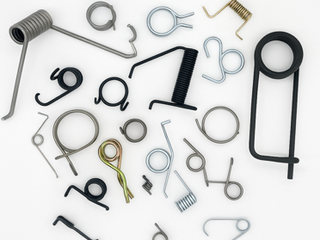 Torsion Springs: A Complete Guide toDesign, Applications, and Manufacturing