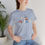 Thumbnail: Cochlear Implant, Books and Coffee, ASL ILY Muted Colors | Unisex Jersey T-Shirt