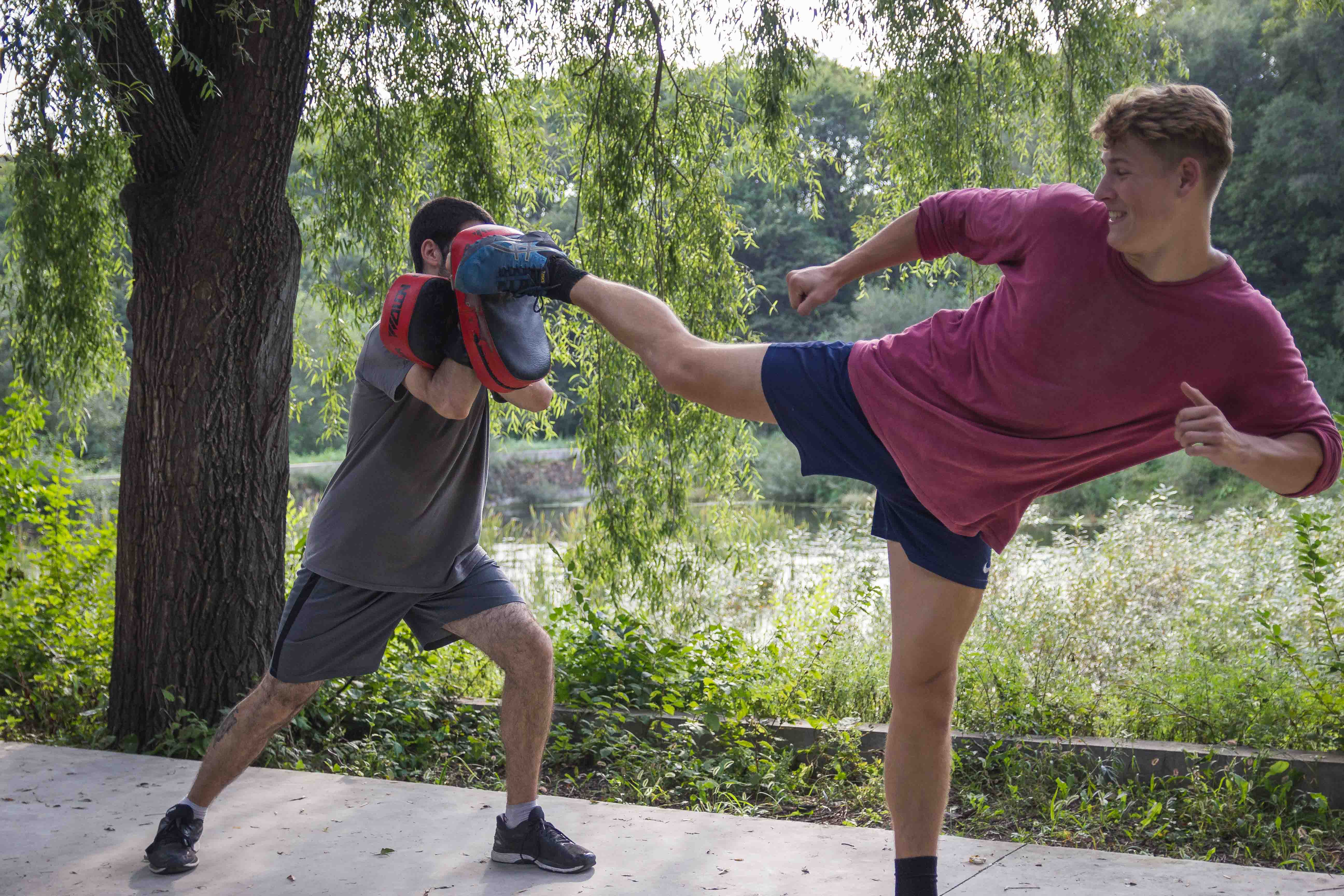 Large man enjoys side kick