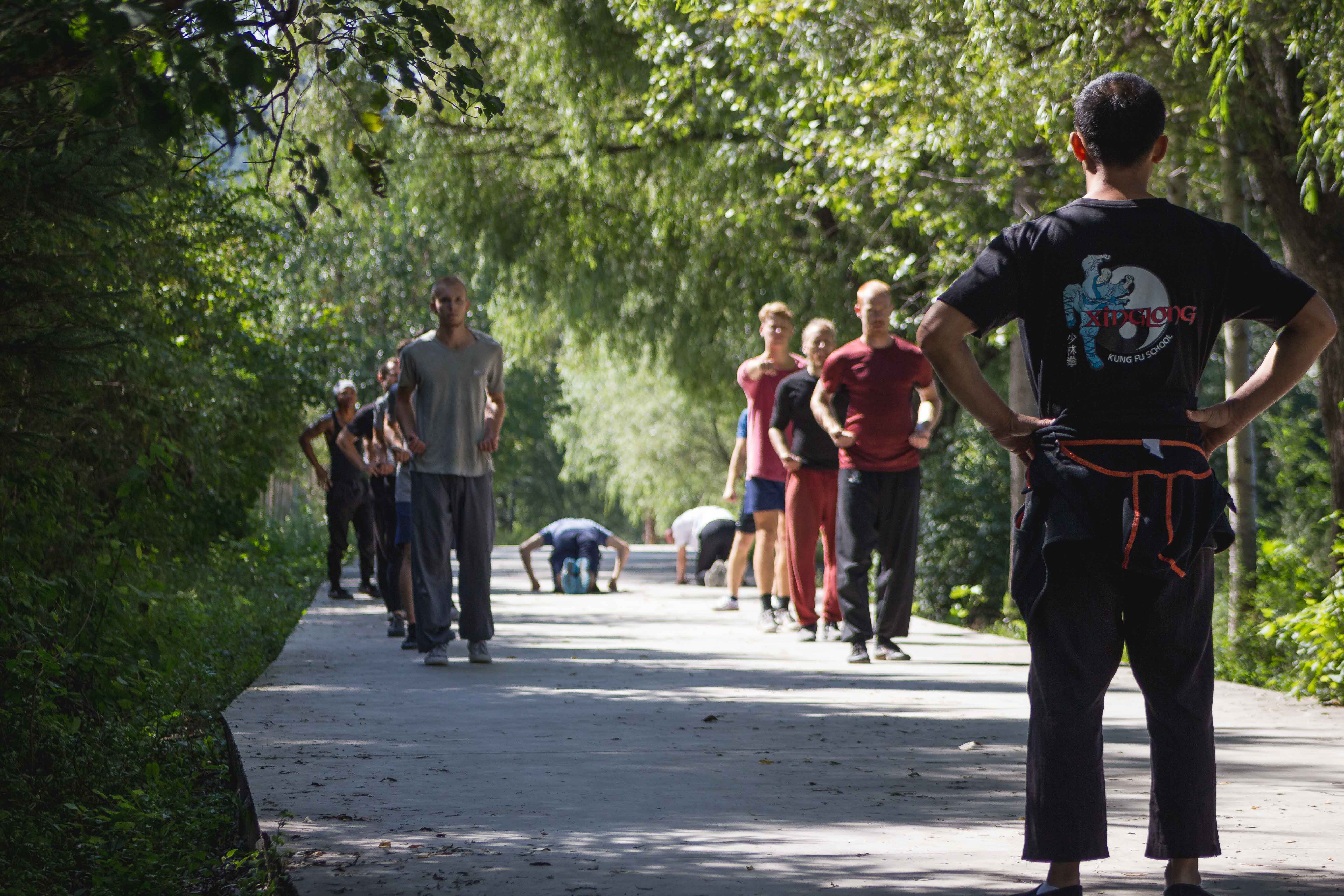 Sifu watching students train