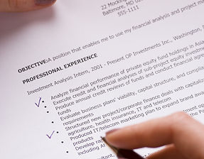 Female hand with professional resume.jpg