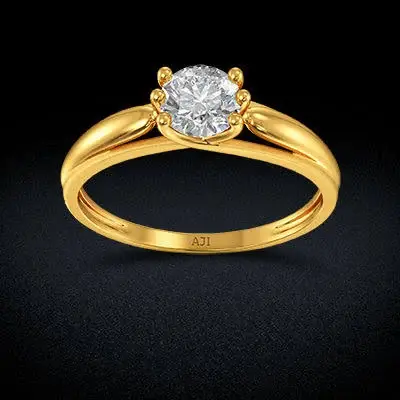 Elegant gold solitaire ring with AJI marking