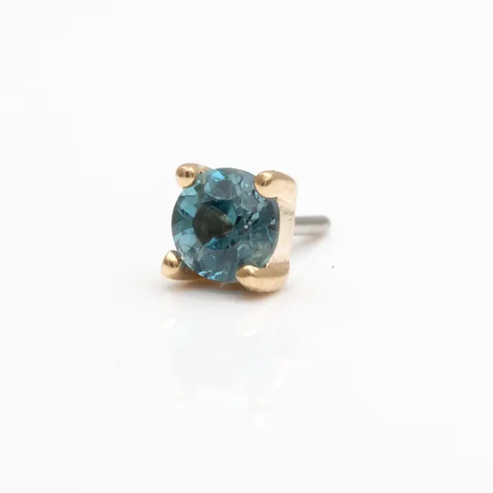 Miniaturbild: Piercingschmuck von Buddha Jewelry aus Gelbgold mit London Blue Topaz