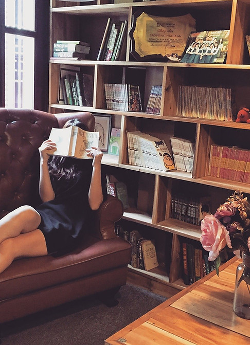 woman reading in a library