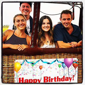 Happy birthday hot air balloon ride passengers