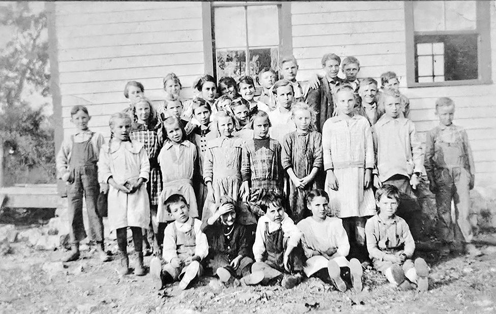 Dulcie's students at Garber school, 1914-15. My Uncle Elmer Jones is at the far right, beneath the window. (Photo courtesy of Mark Jones)