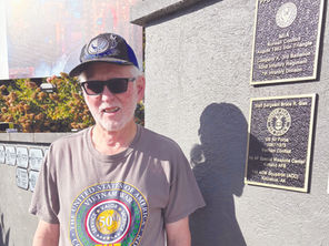 Veteran volunteer honored with plaque at Memorial Garden