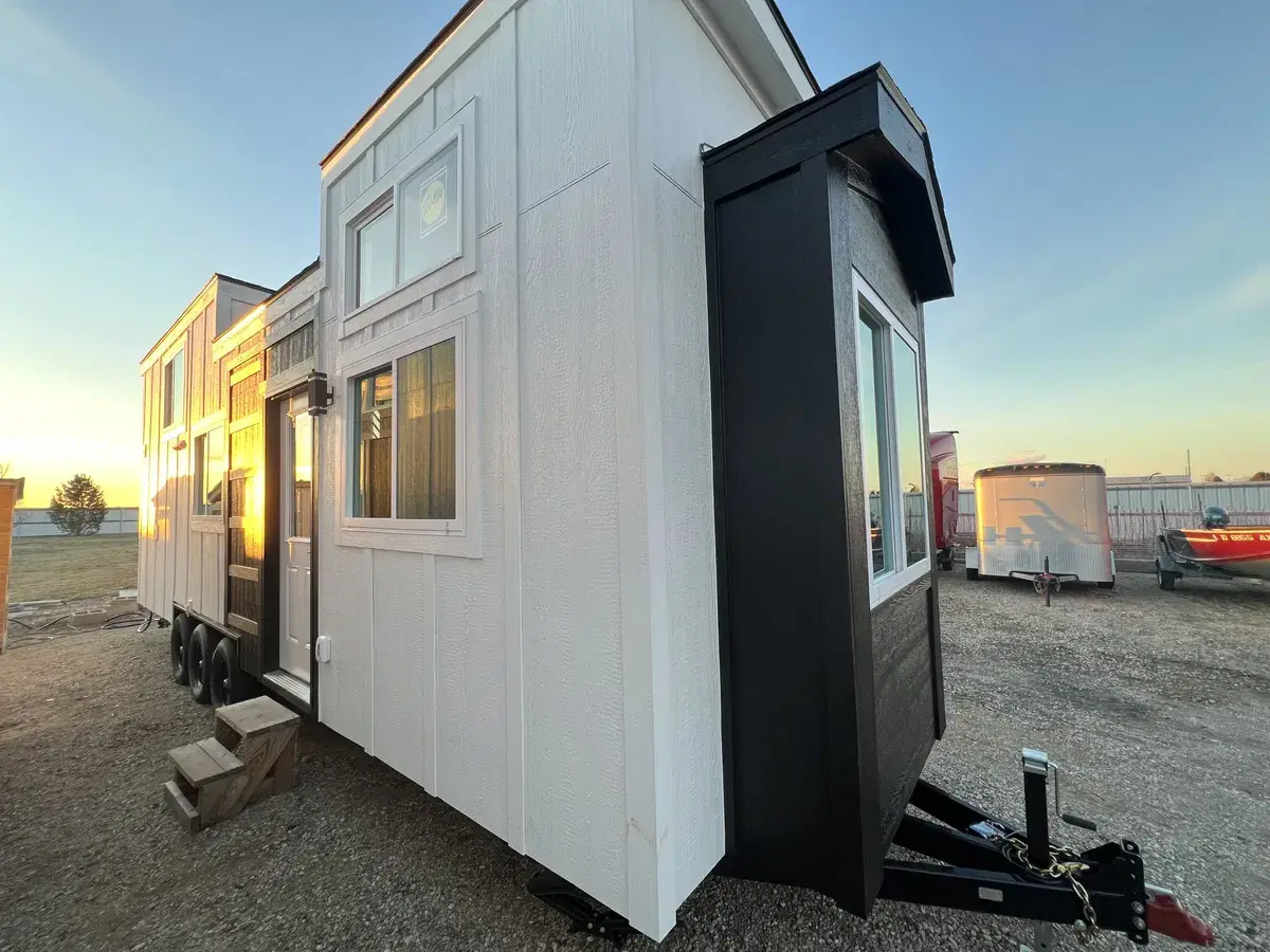Get ready to explore this charming 28-foot affordable tiny house on wheels