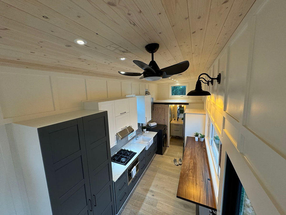 Thumbnail: Check out this new tiny house on wheels! It features a full kitchen