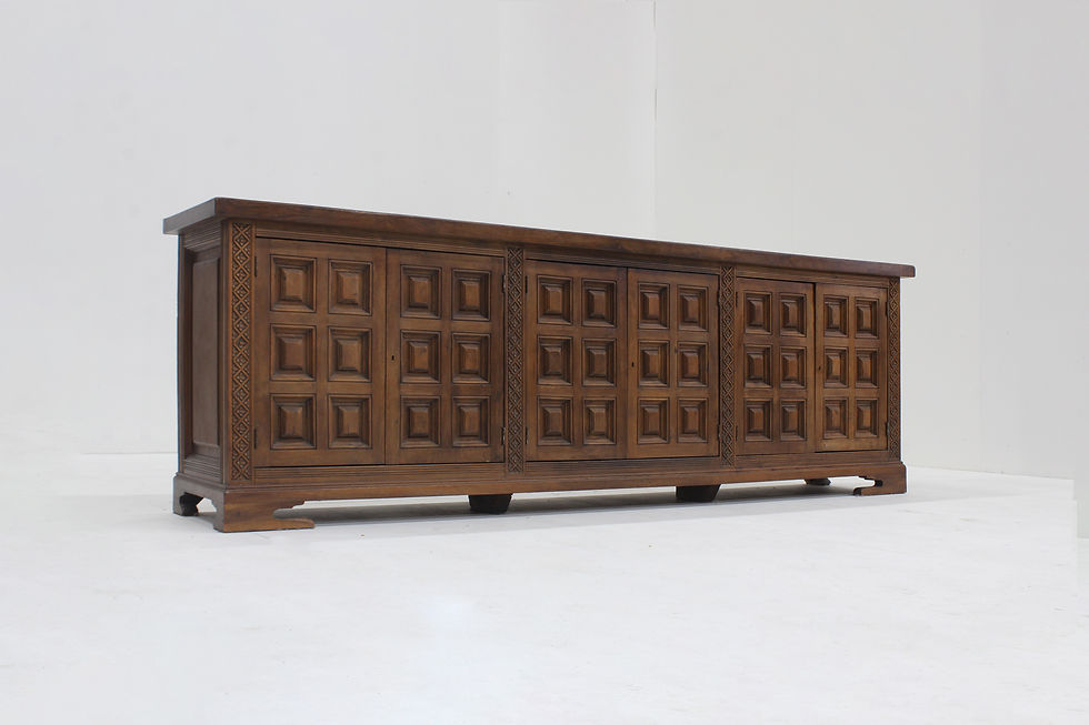 Spanish Brutalist Sideboard in solid wood from the 1960s. Beautifully designed with graphical squared wood carvings on the fr