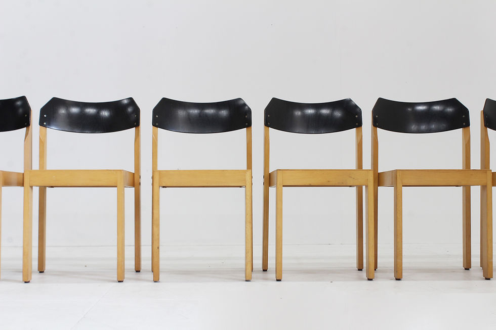 Thumbnail: Vintage stackable mid century dining chairs made of wood with black lacquered backrest. Easily stackable. German production o