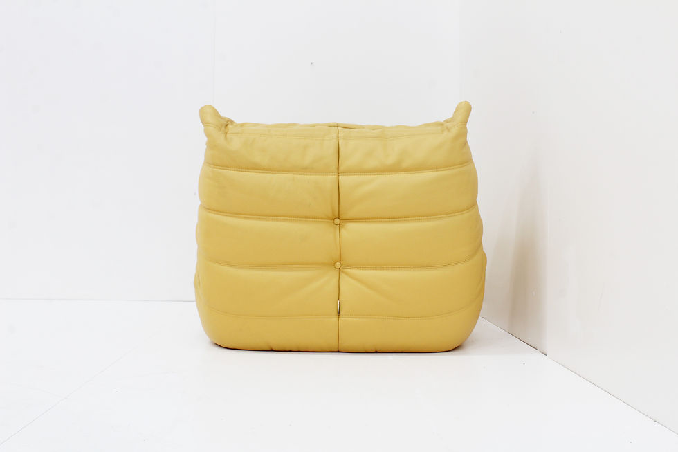 Thumbnail: Togo armchair yellow leather by Michel Ducaroy for Ligne Roset   Original vintage yellow leather Togo armchair from Ligne Ros