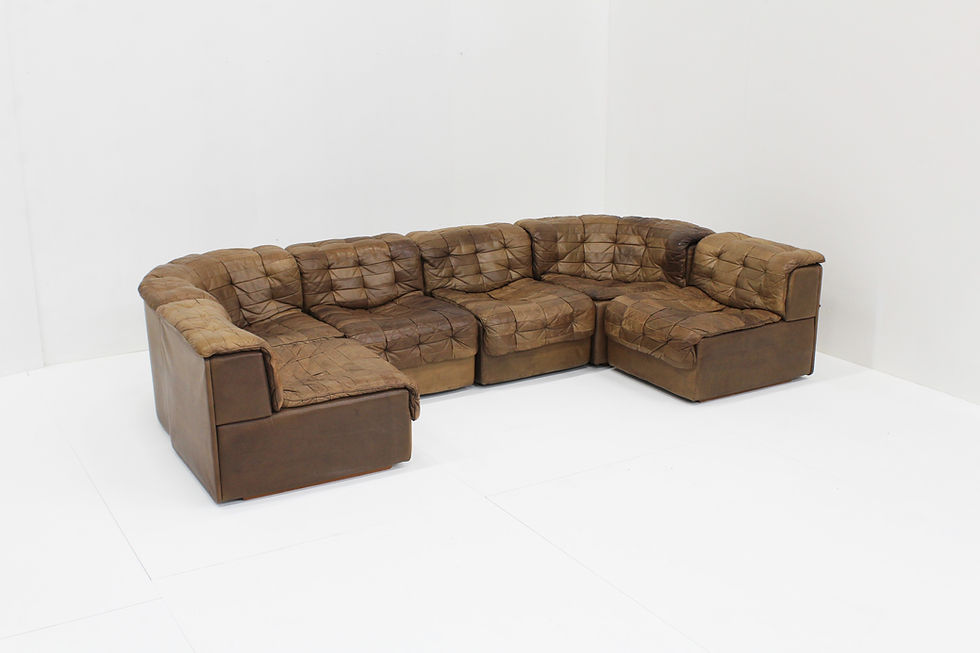 Vintage De Sede DS 11 modular sofa in brown patchwork leather from Switzerland, 1970s. The sofa is very large and has multipl
