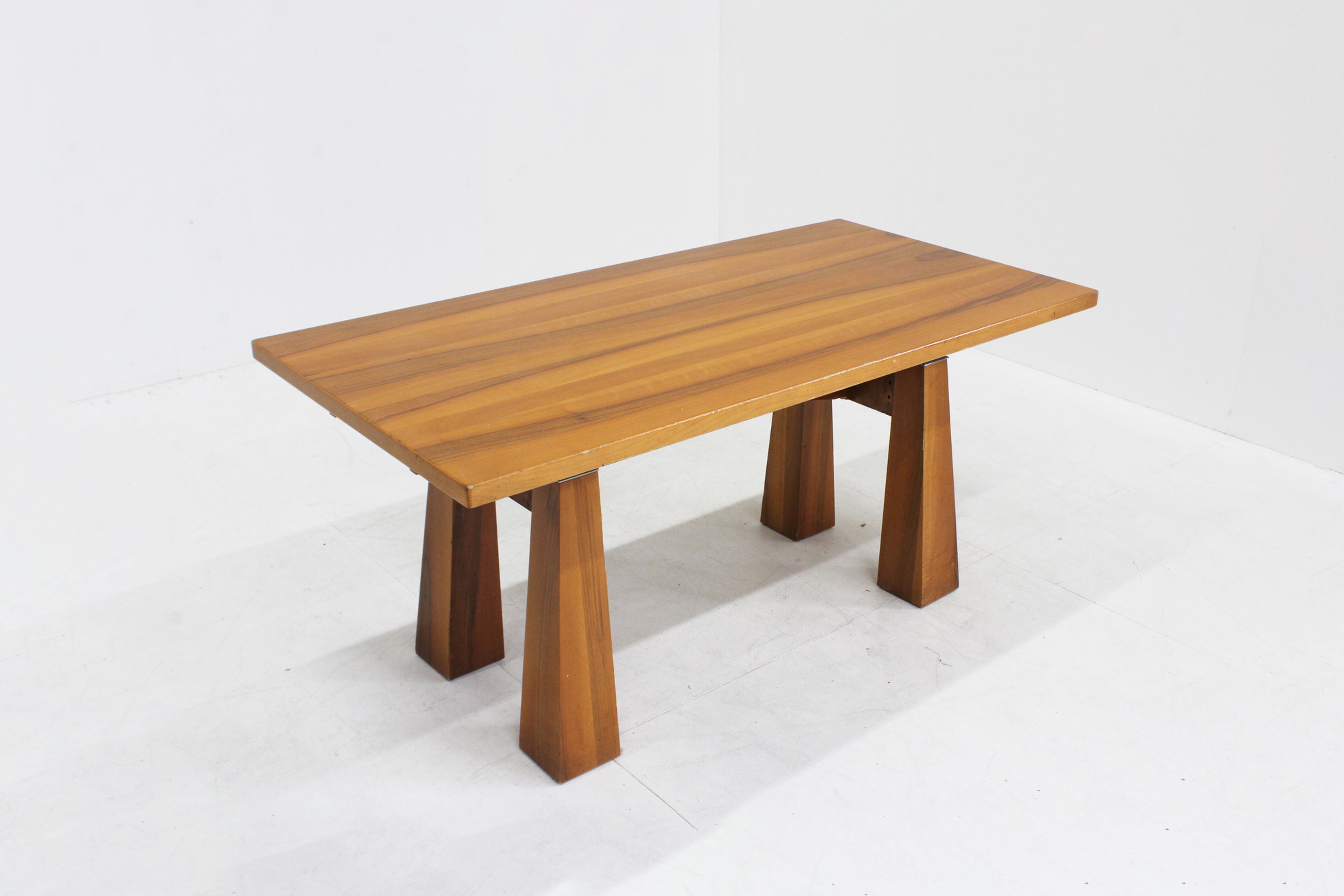 Vintage Italian dining Table designed in the 1960s. Wooden rectangular dining table with sculptural design.