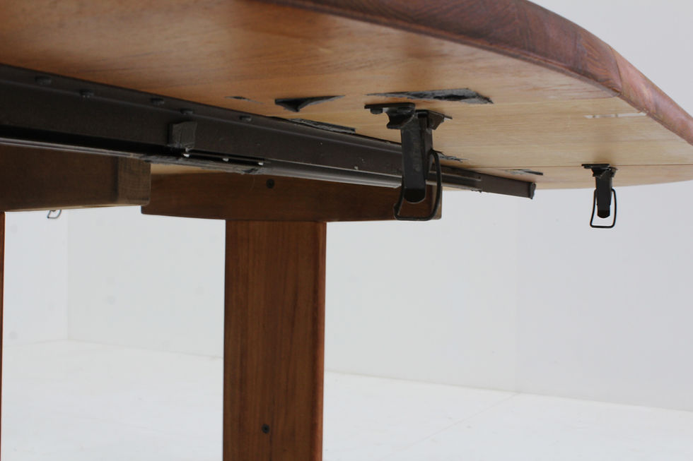 Thumbnail: Vintage Danish round extendable dining table from the 1960s made of solid teak wood. This Danish dining table can be extended