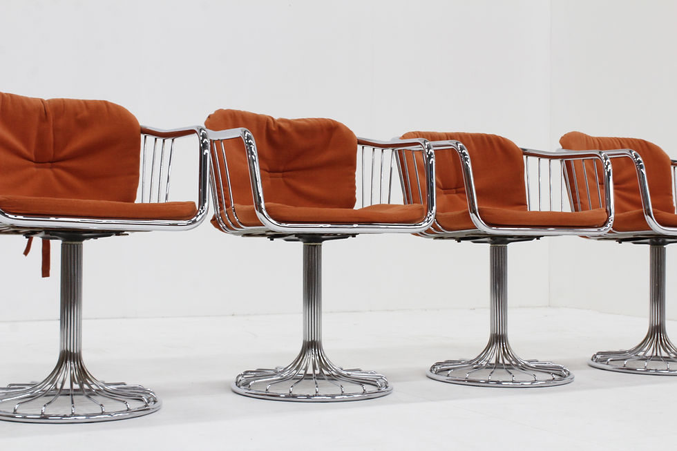 Thumbnail: Set of 4 vintage swivel dining room chairs with chrome frame and orange fabric upholstery.