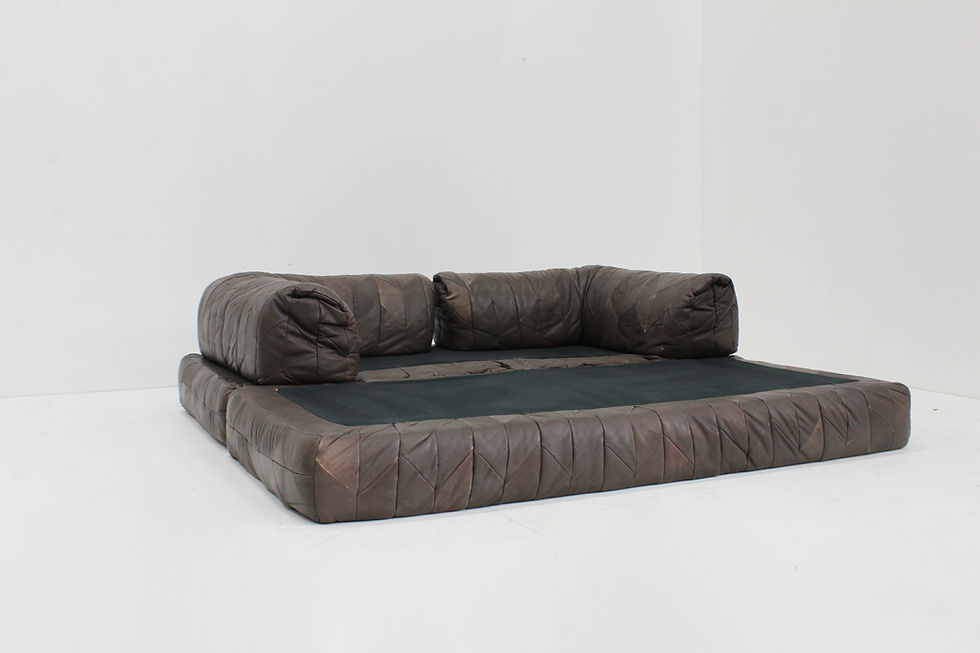 Thumbnail: Vintage 1970s leather patchwork sofa with a bold, sculptural design.