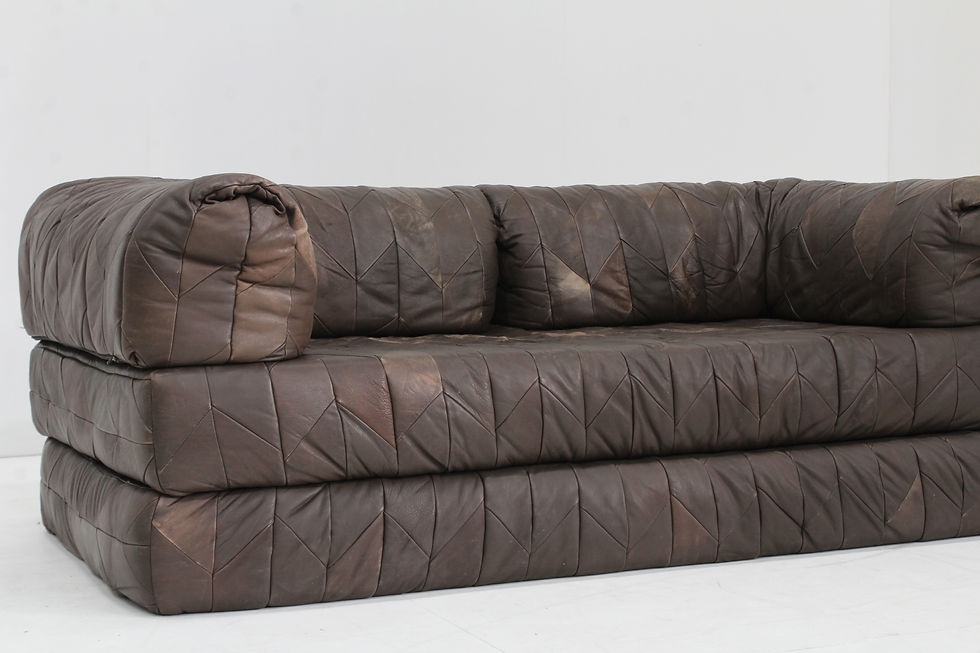 Thumbnail: Vintage 1970s leather patchwork sofa with a bold, sculptural design.